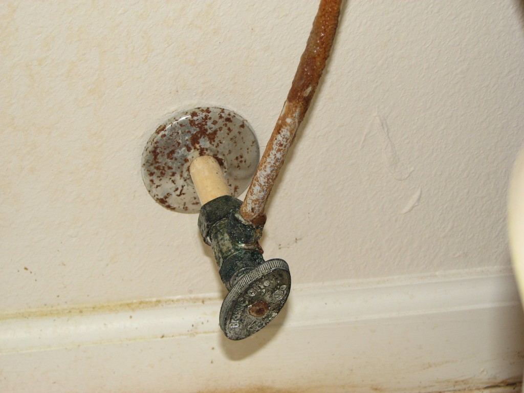 Corroded Water line and flange.