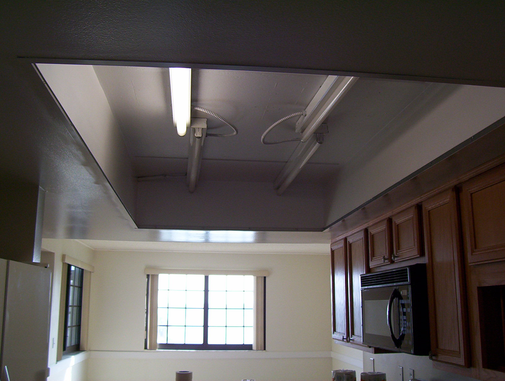 Cocoa Beach condo kitchen grid ceiling removed