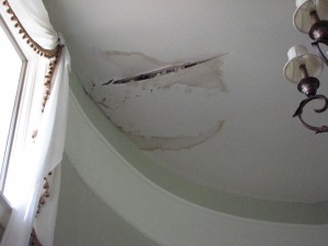 Water damaged ceiling from roof leak.