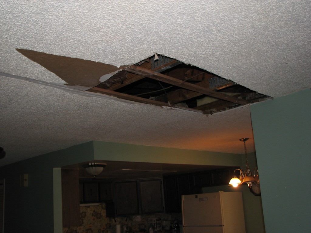 Living room water damaged drywall ceiling