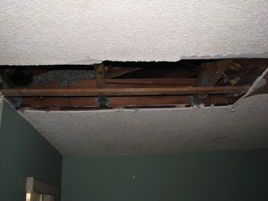 Water damaged drywall popcorn ceiling