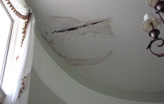 Water damaged ceiling from roof leak.