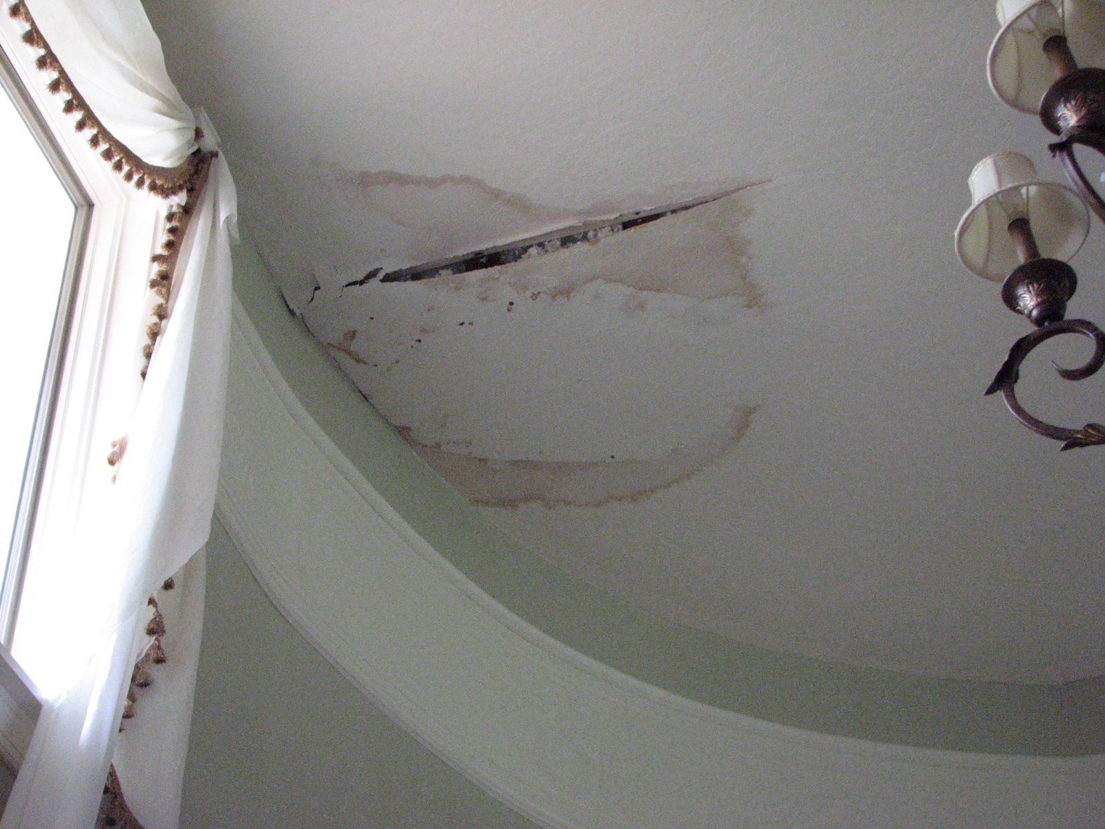 damaged ceiling drywall water repair damage repairs rain leak damp penetrating cracks roof ceilings trowel penetration causes restoration skip peckdrywallandpainting