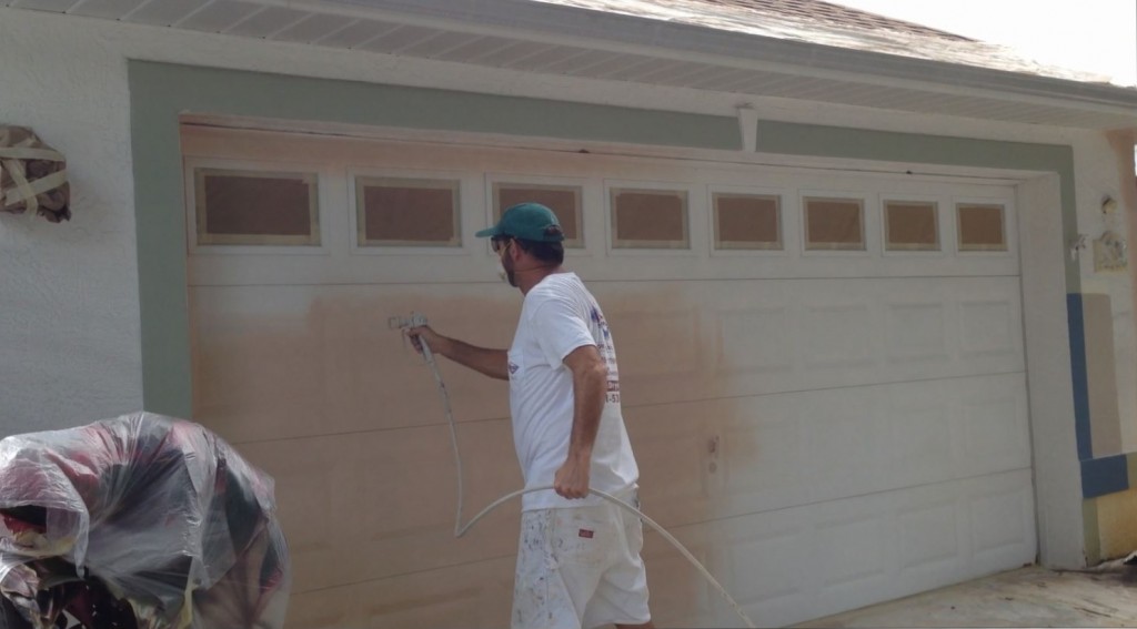 How to paint a garage door - Garage Door Spraying Primer Sealer 1024x567